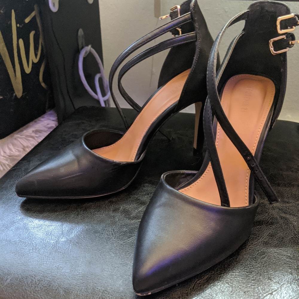 Black pointed toe heels